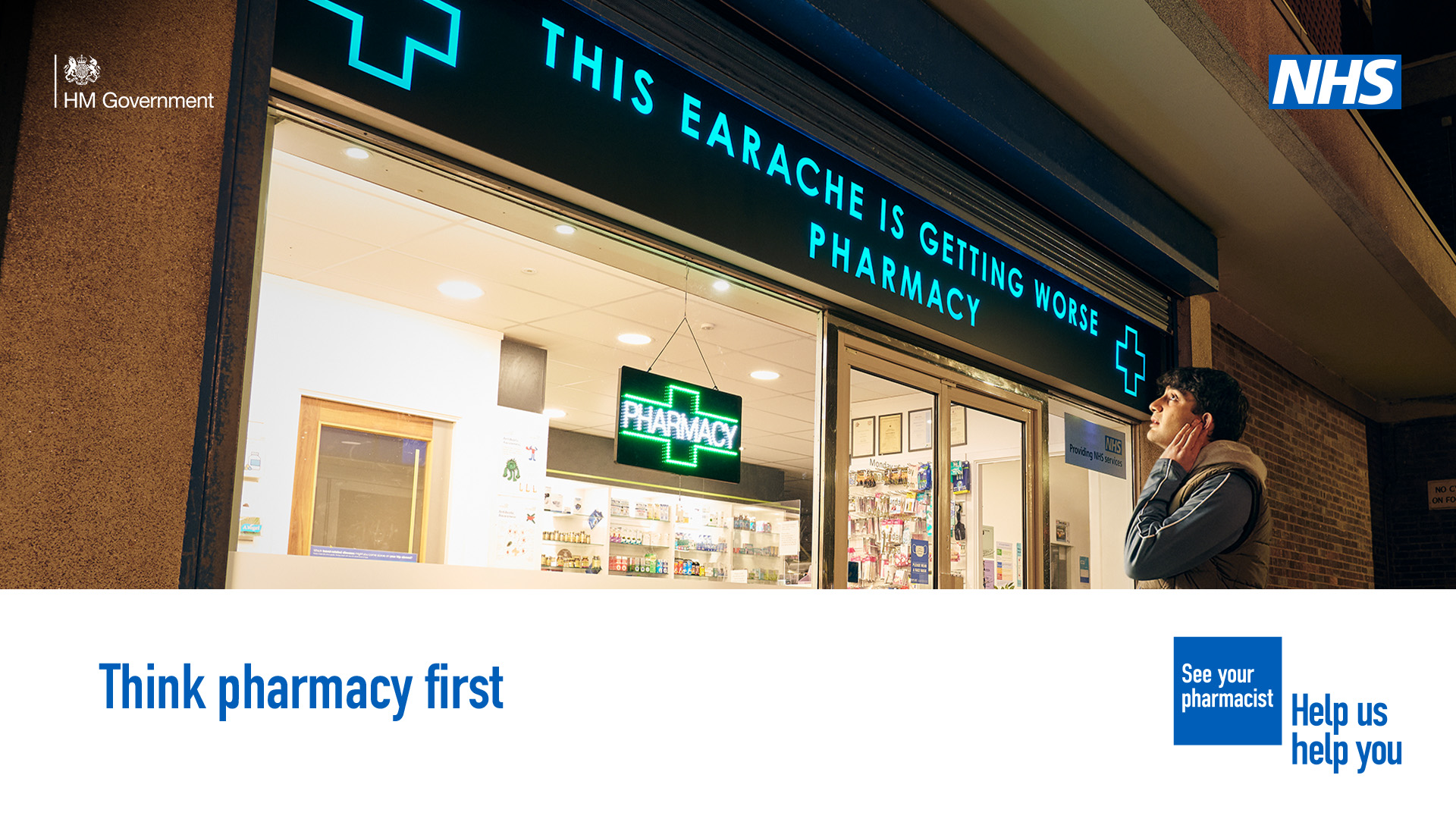 a person stood outside a pharmacy holding their ear with the pharmacy sign reading this earache is getting worse